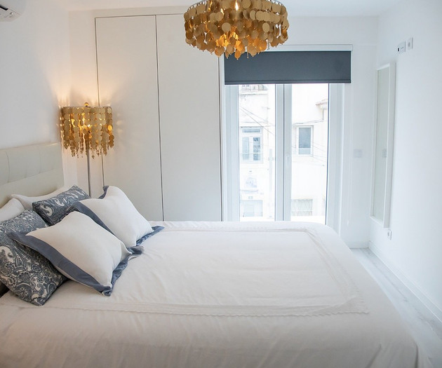 Bright bedroom with balcony access