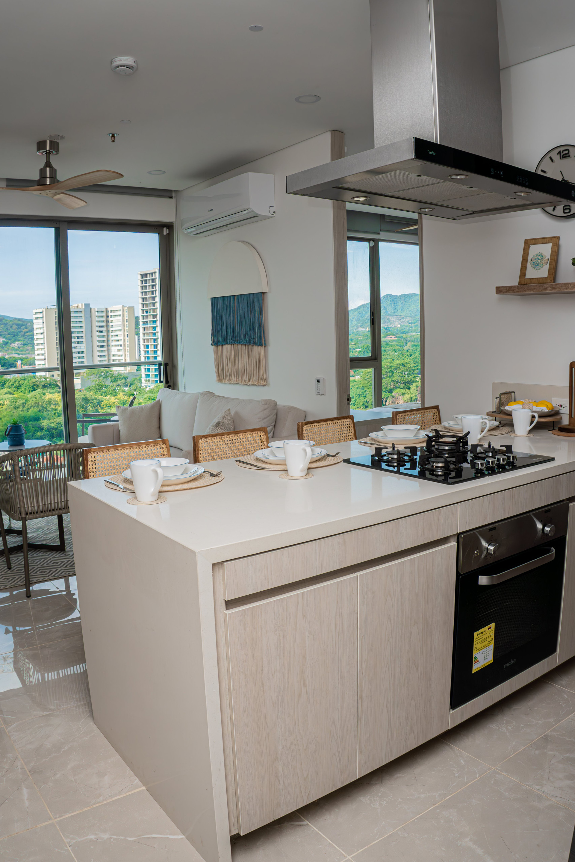 Kitchen island with cooktop and oven