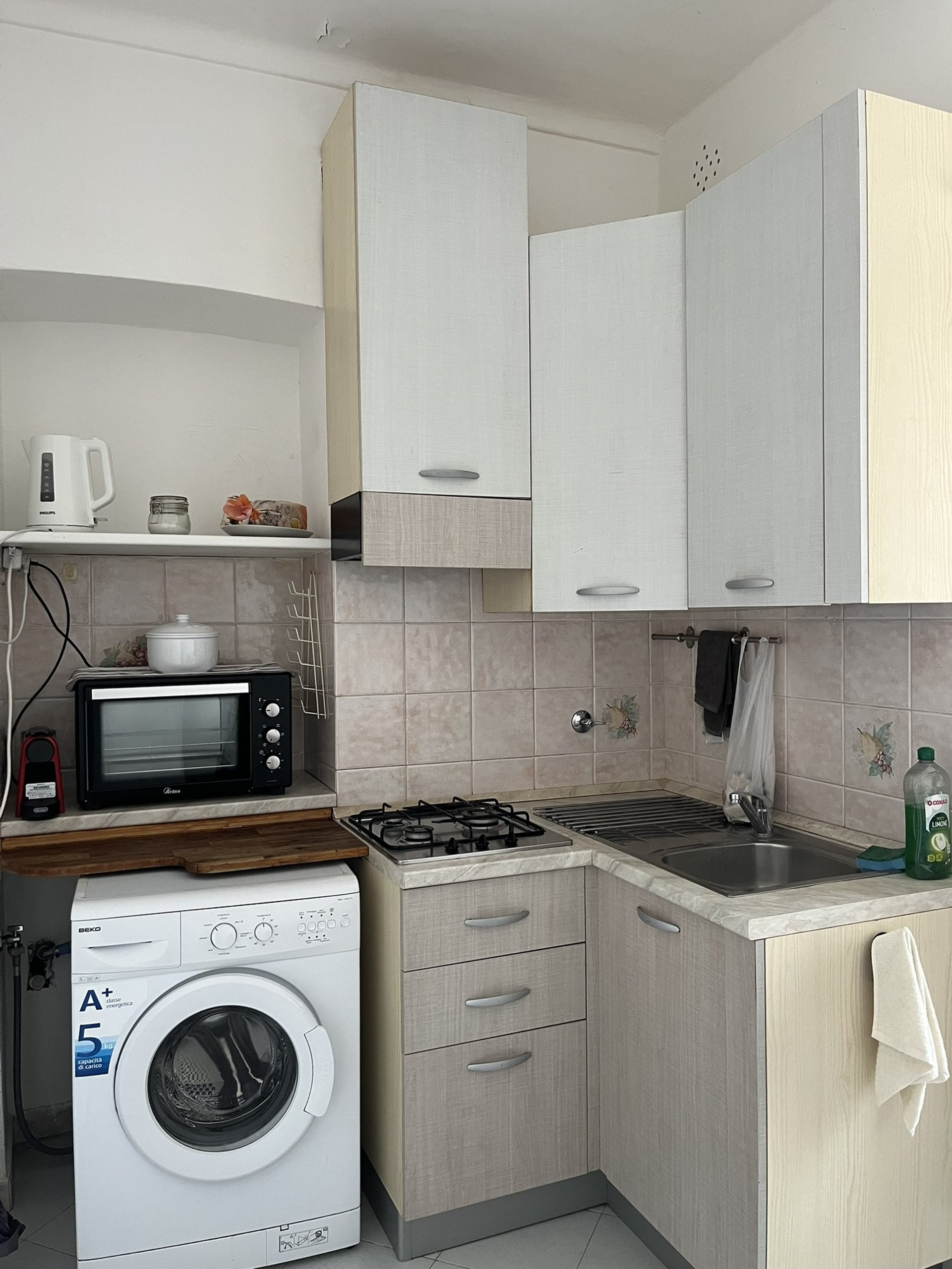 Kitchen with gas stove washing machine