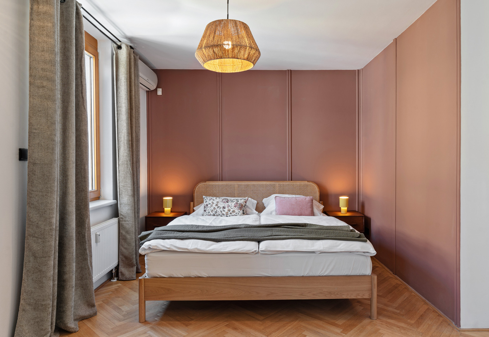 Master bedroom pink wall double bed