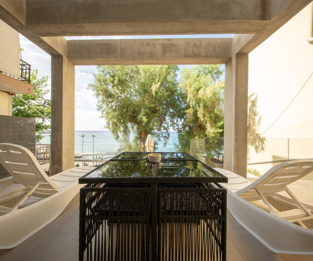 Terrace table and sun loungers