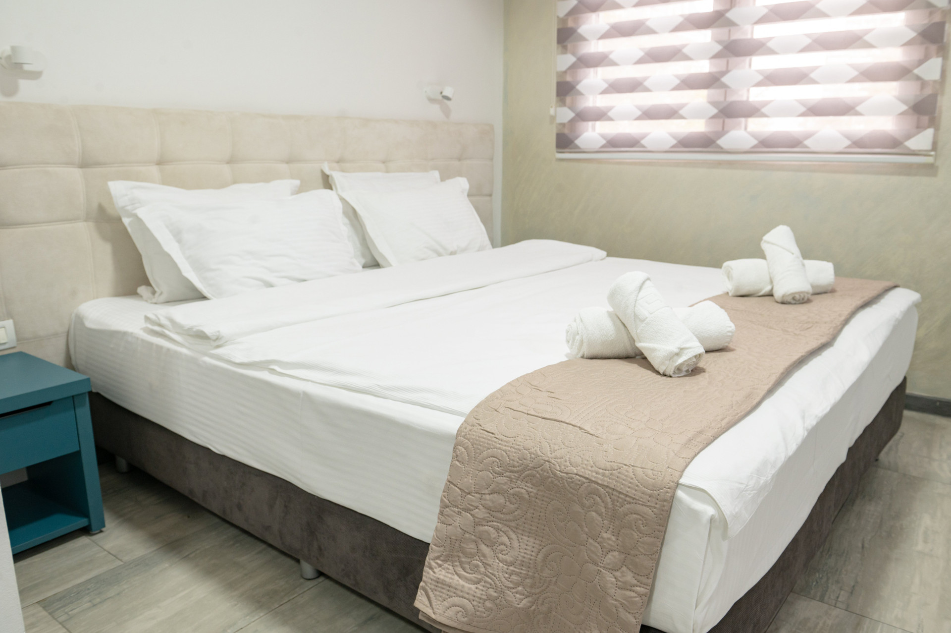 Bed with towel decoration
