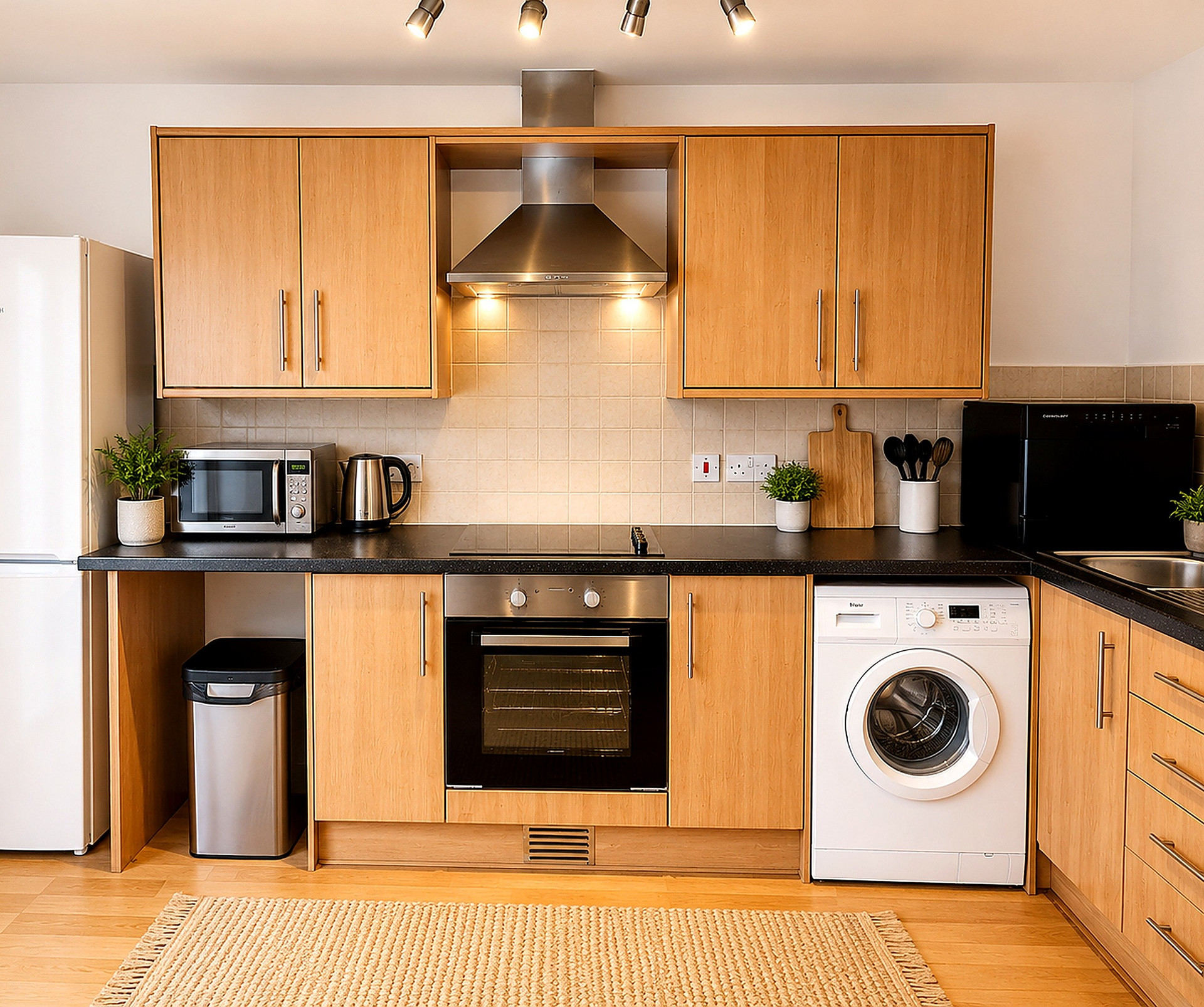 Kitchen with oven and washer