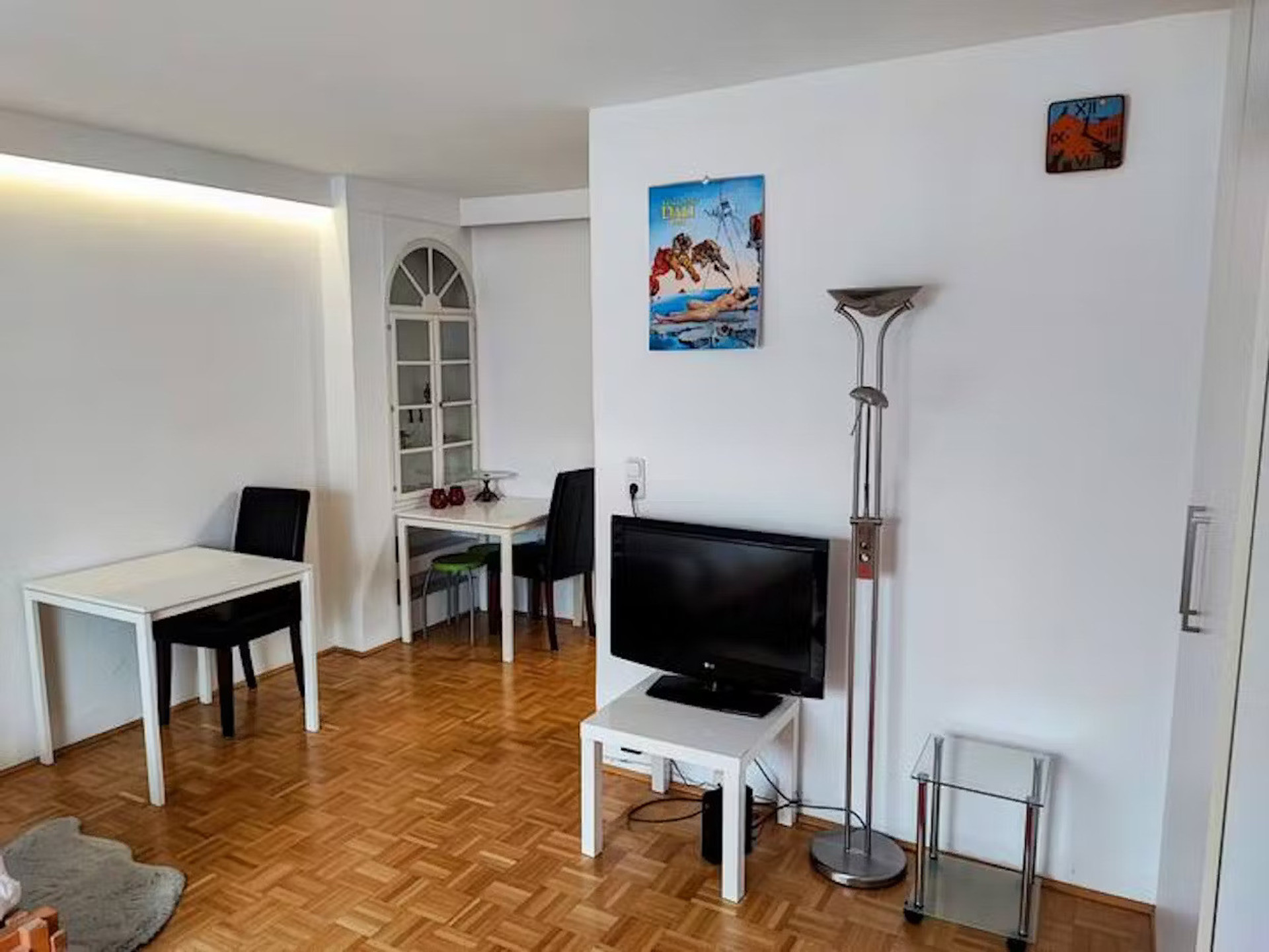 Living room with TV and dining