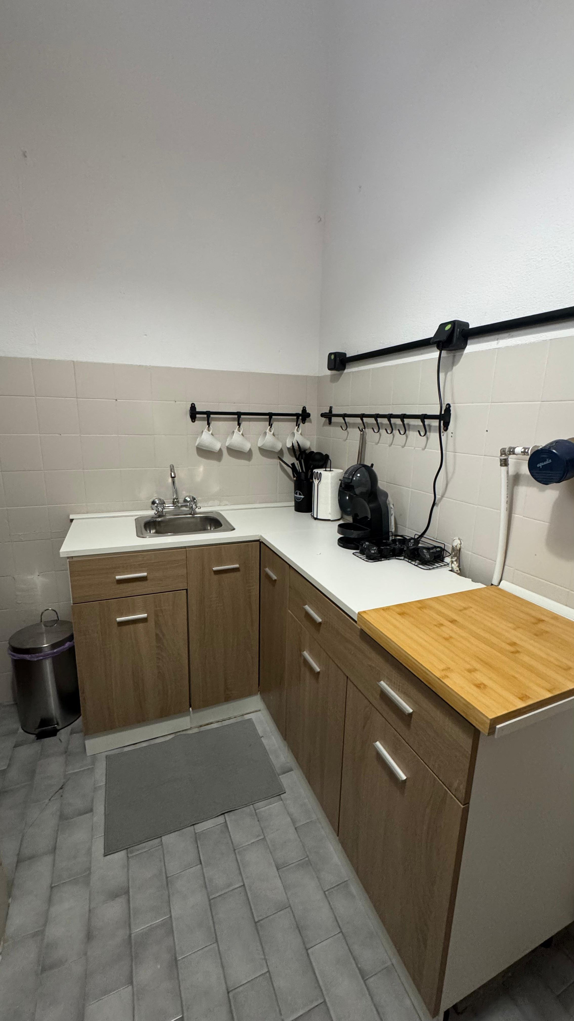 Compact kitchen with wooden countertop