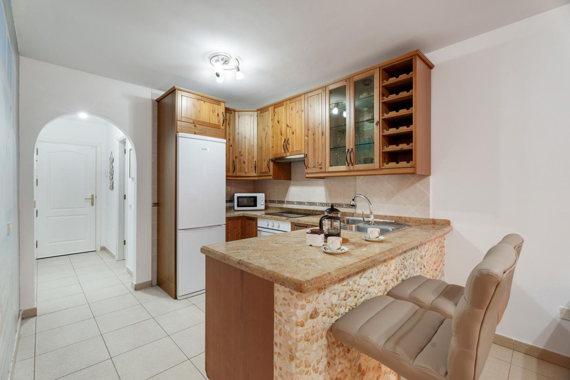 Kitchen with breakfast bar seating
