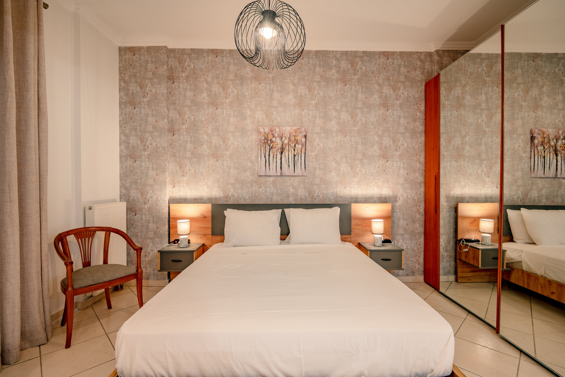 Bedroom with double-bed and wardrobe