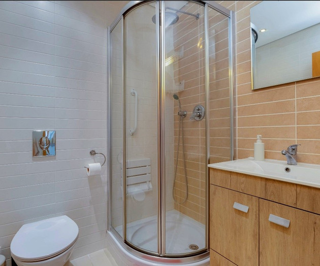 Bathroom with corner shower