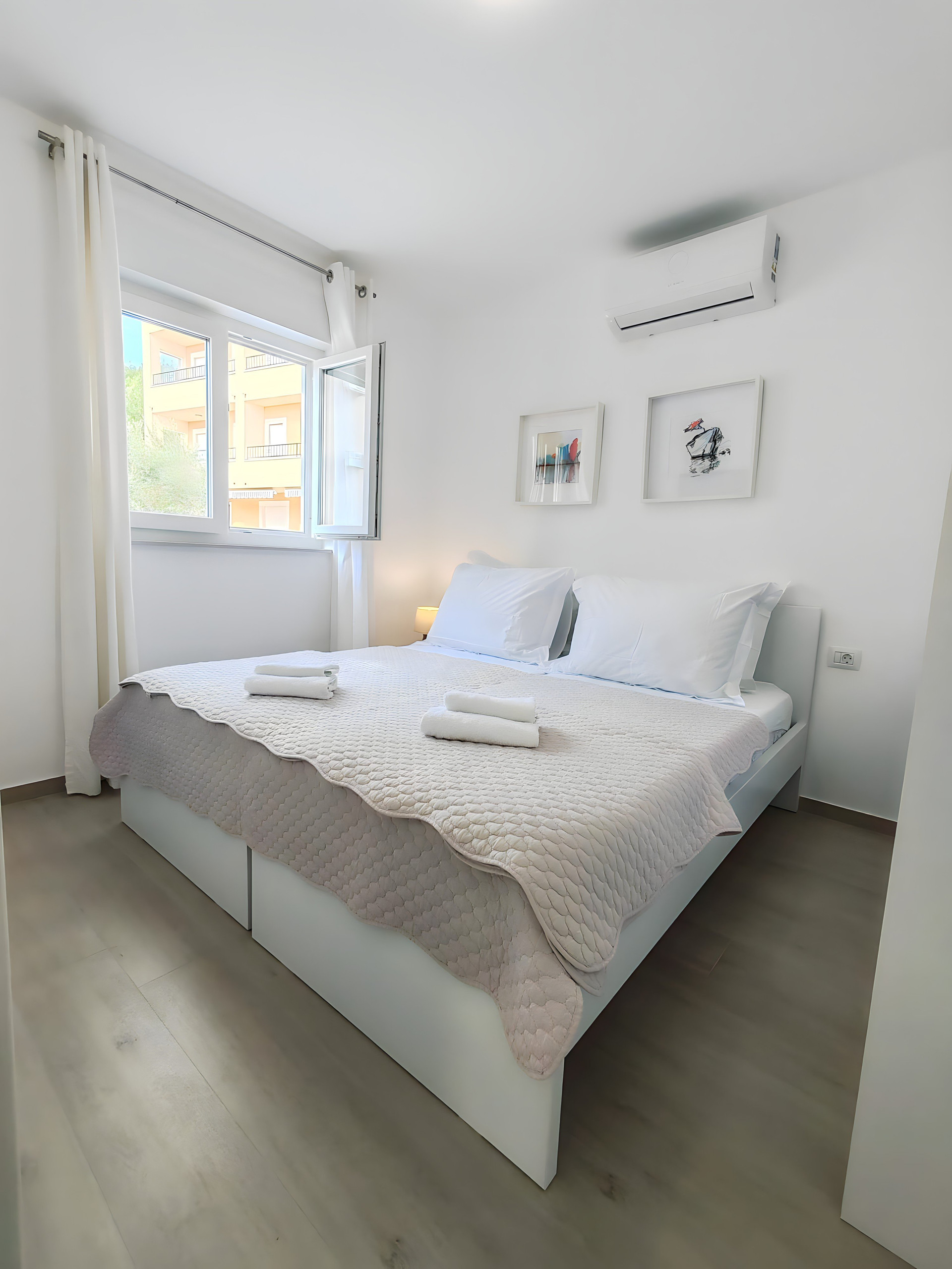 Bright bedroom with double bed