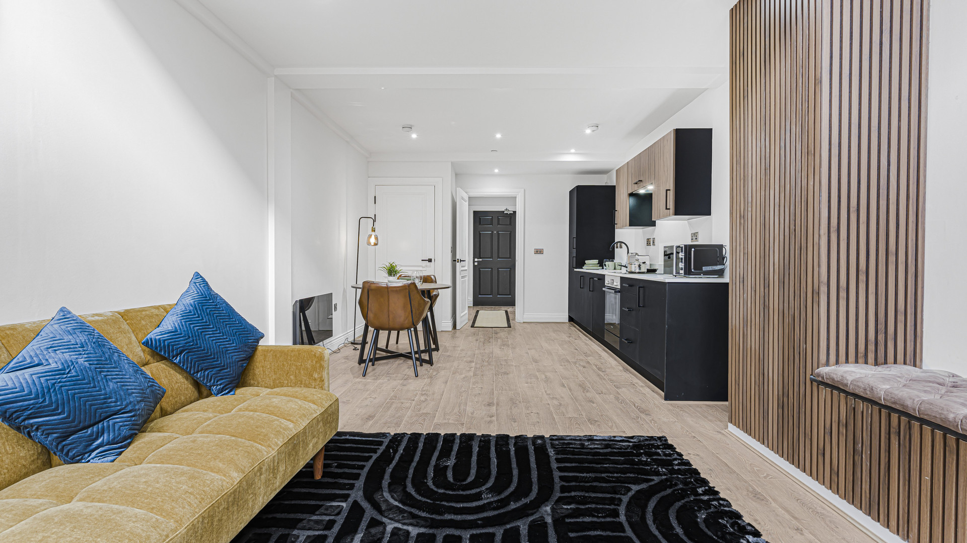 Living room with kitchen overview