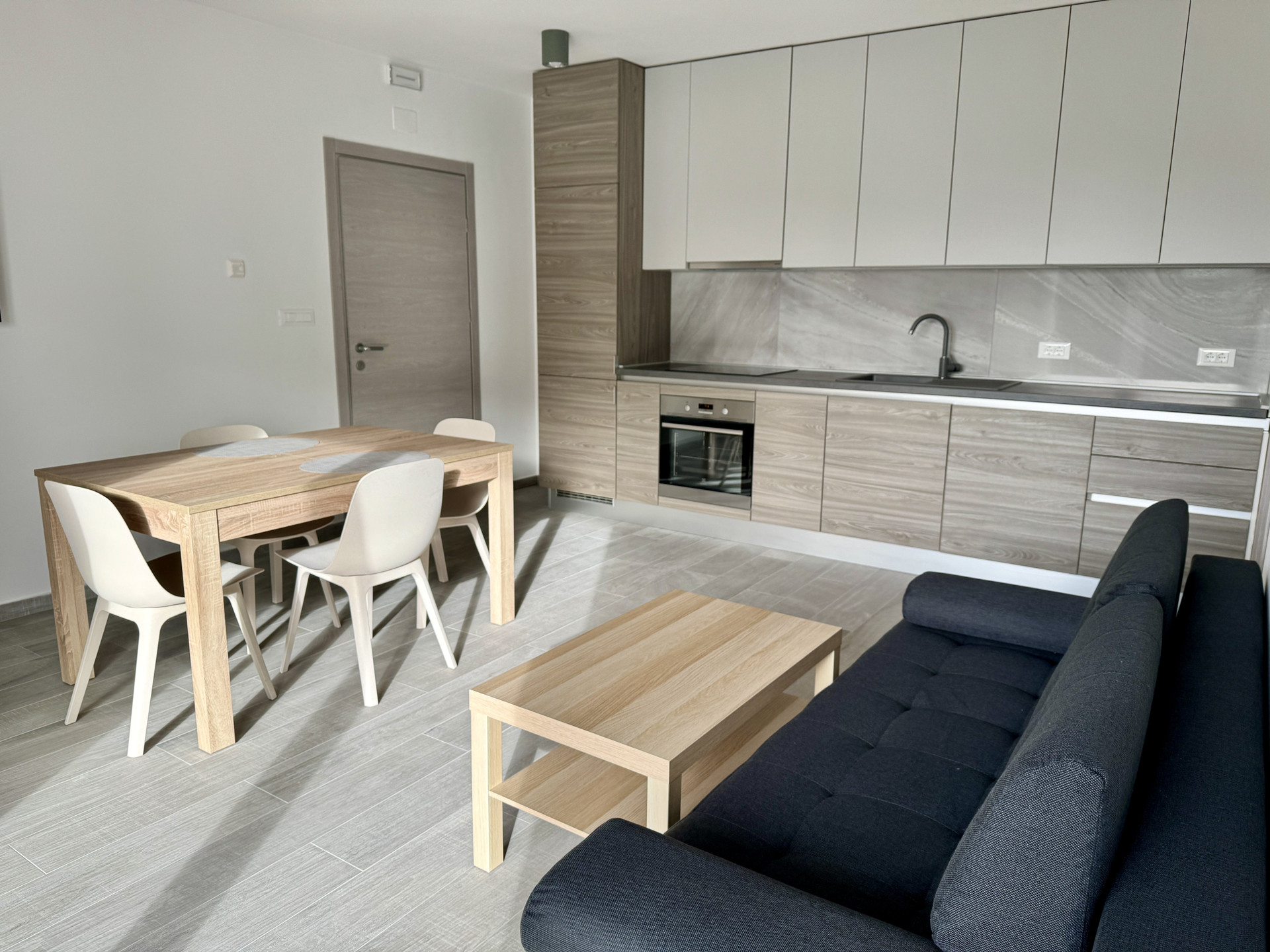 Living room, dining and kitchen