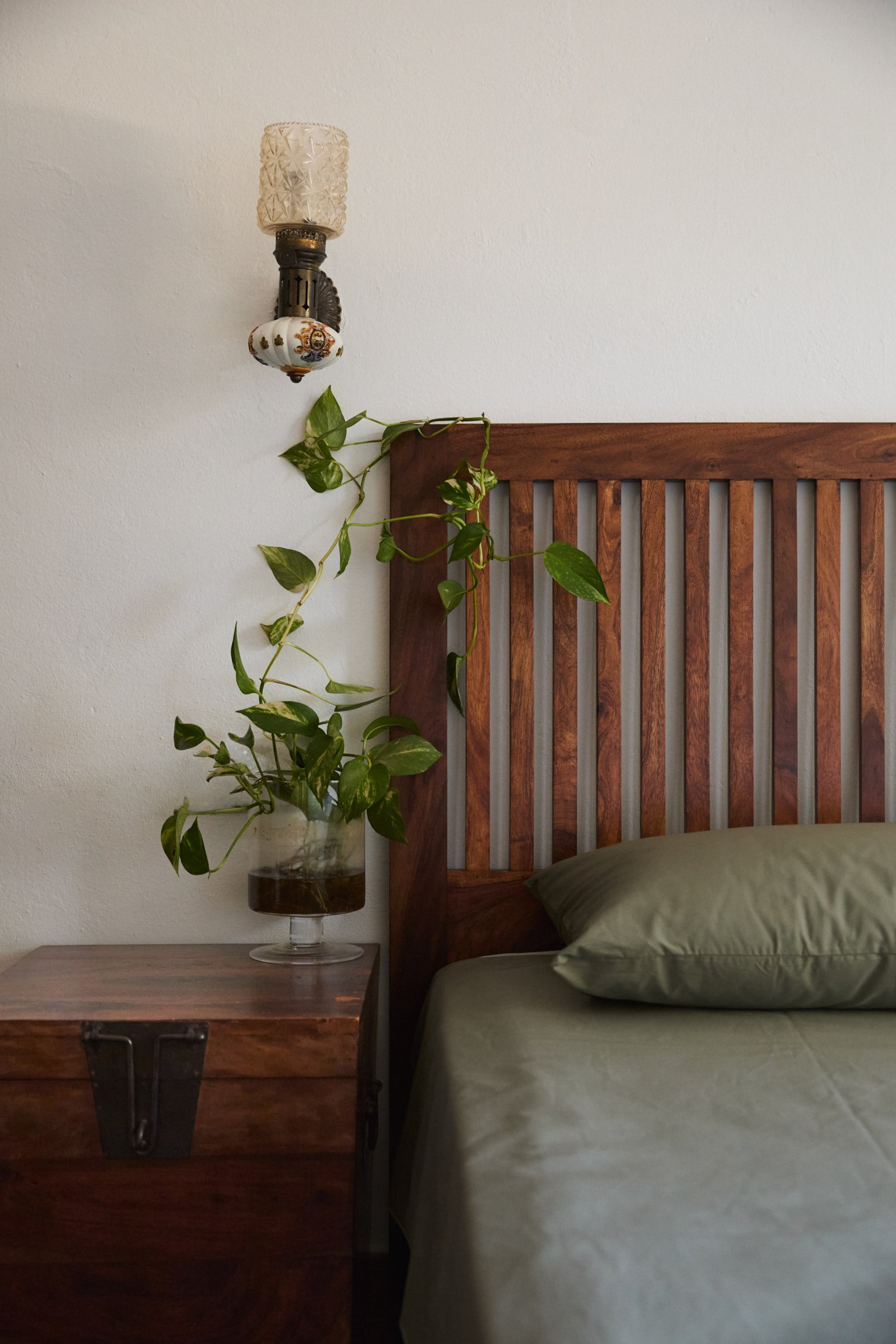 Bedroom headboard with plant detail