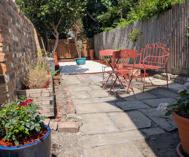 Garden path with potted plants