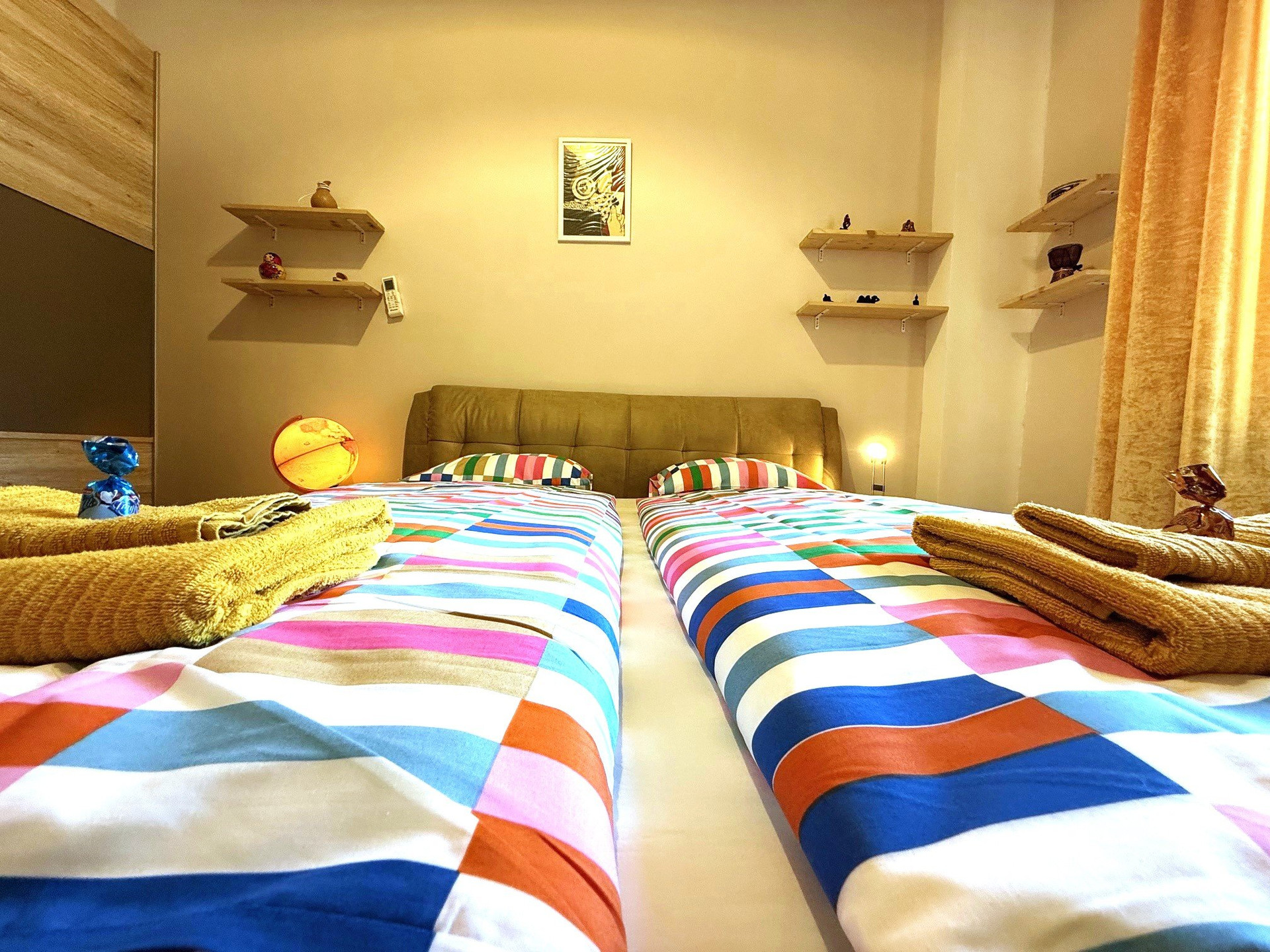 Bedroom with colorful bedding