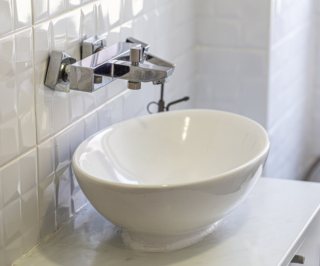 Vessel sink with faucet