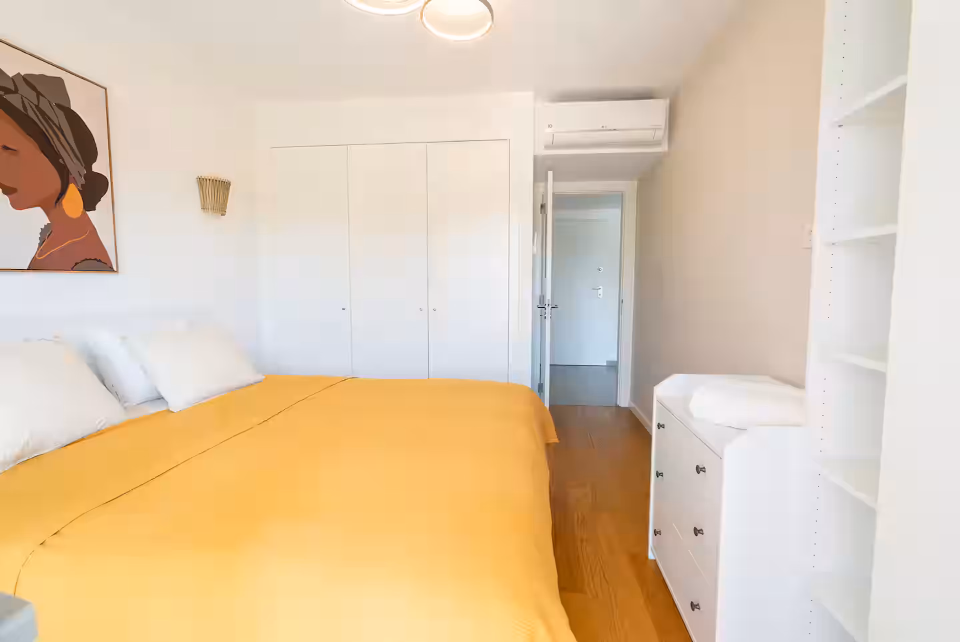Bedroom with yellow bedspread