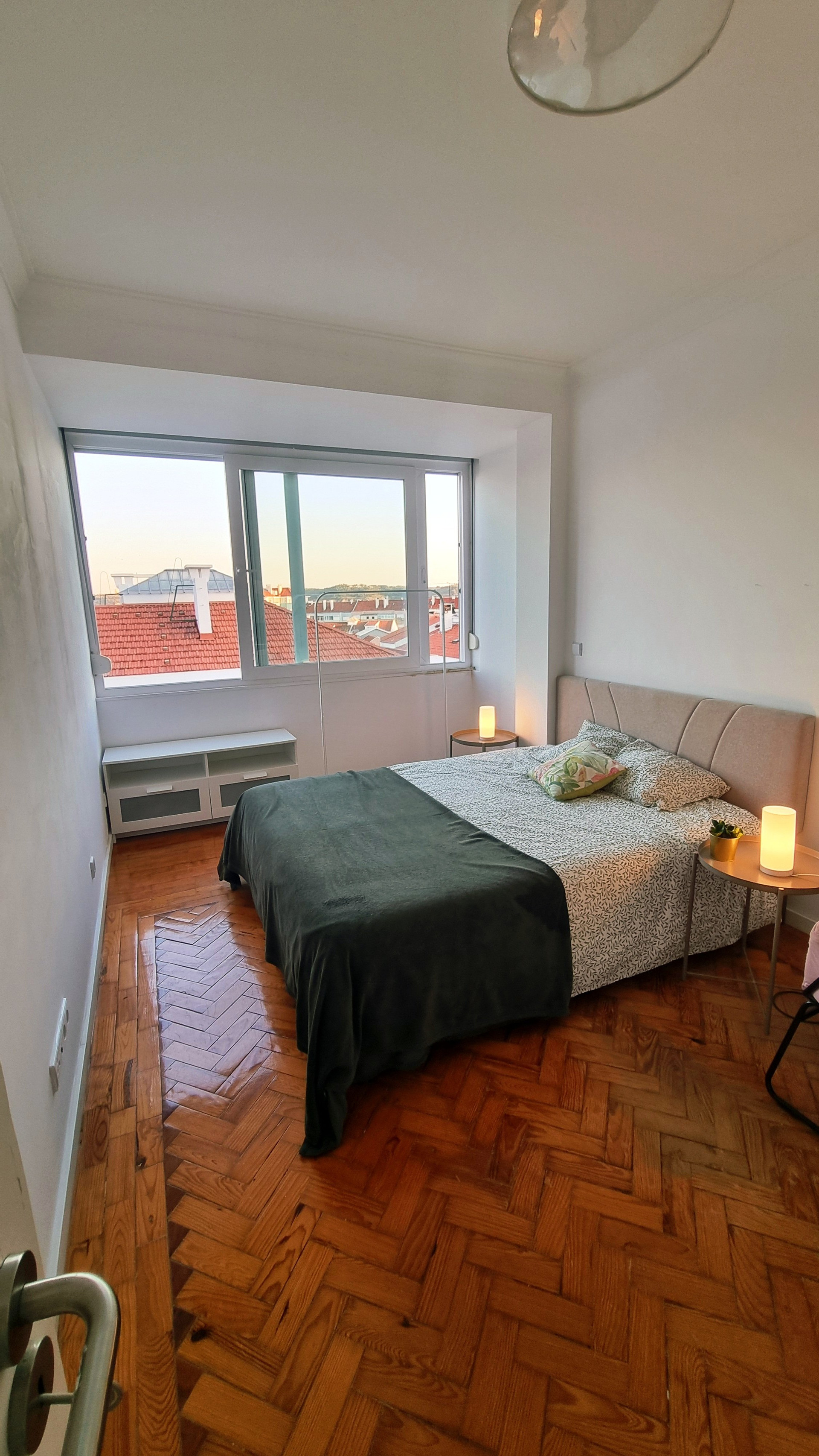 Bedroom with city view window