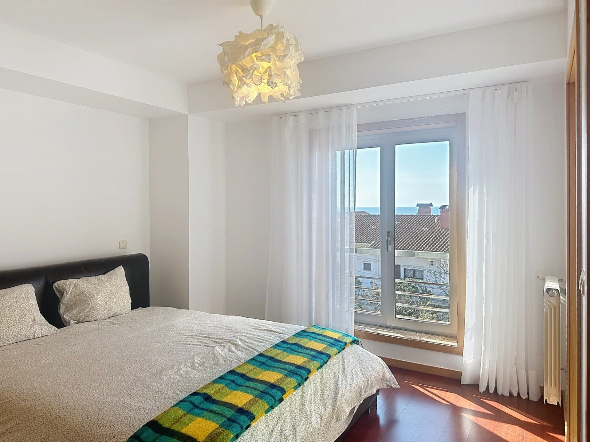Bedroom with sea view window