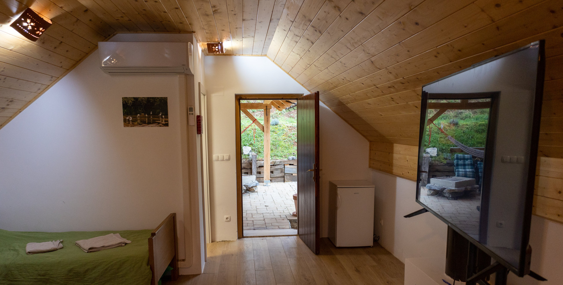 Attic bedroom with TV and terrace