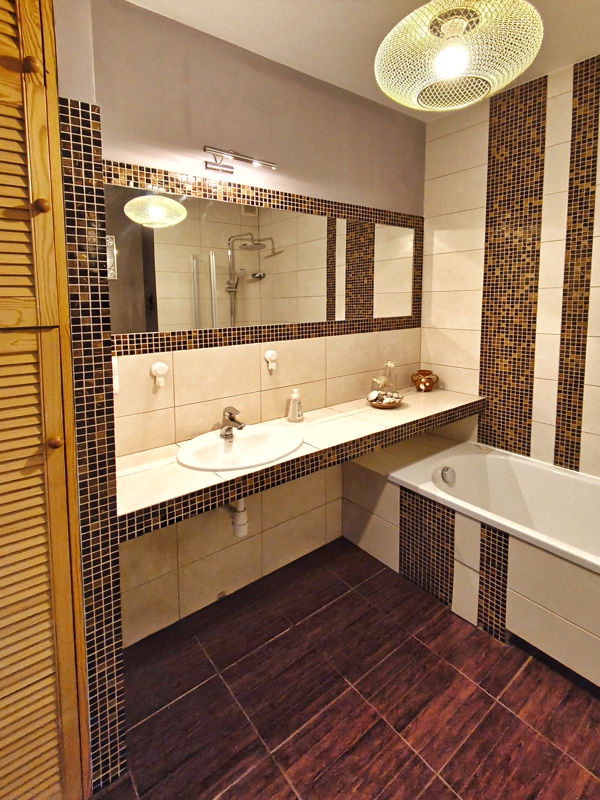 Modern bathroom with mosaic tiles
