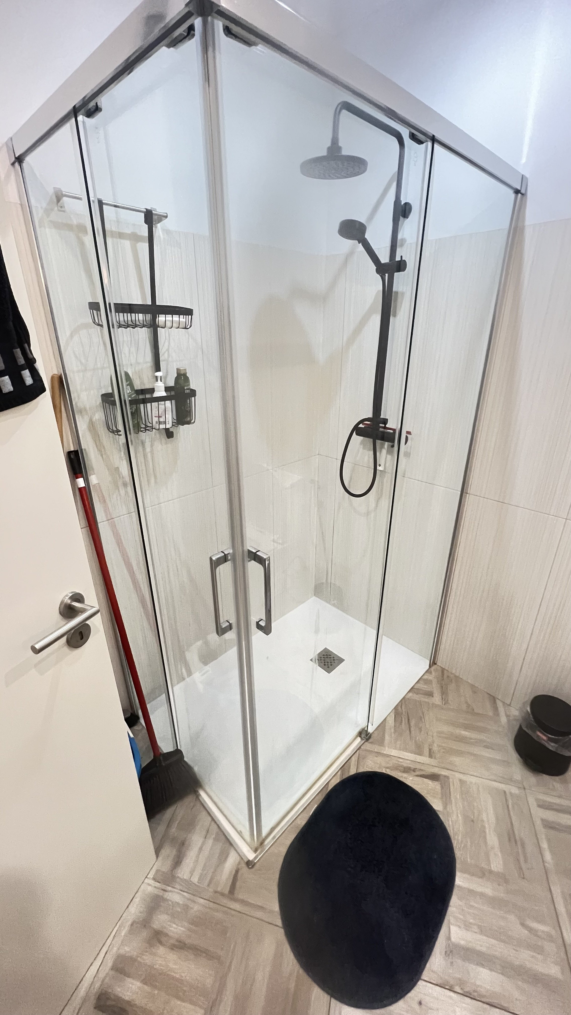 Glass shower enclosure