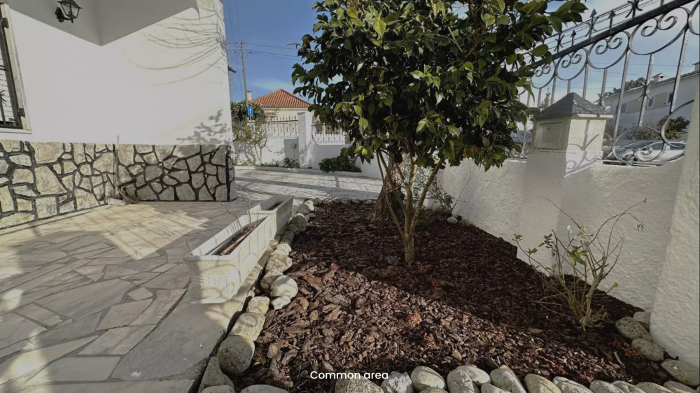 Room in a house with garden and barbecue