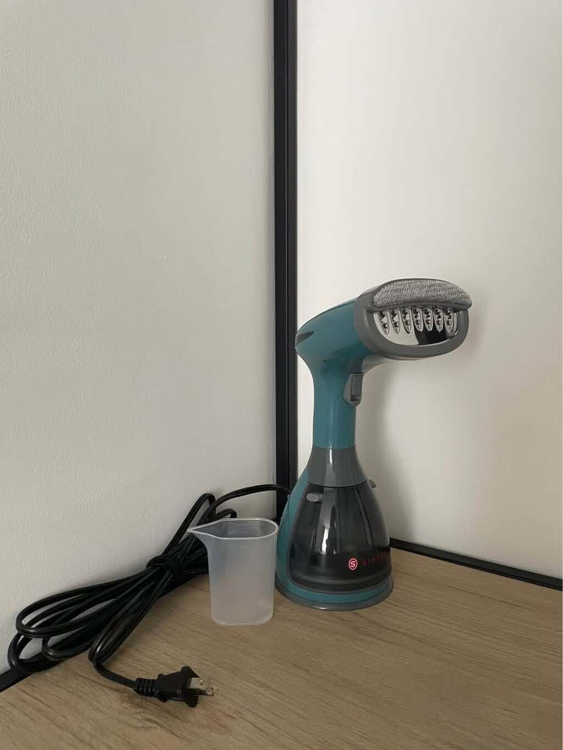 Steam iron available for your convenience.