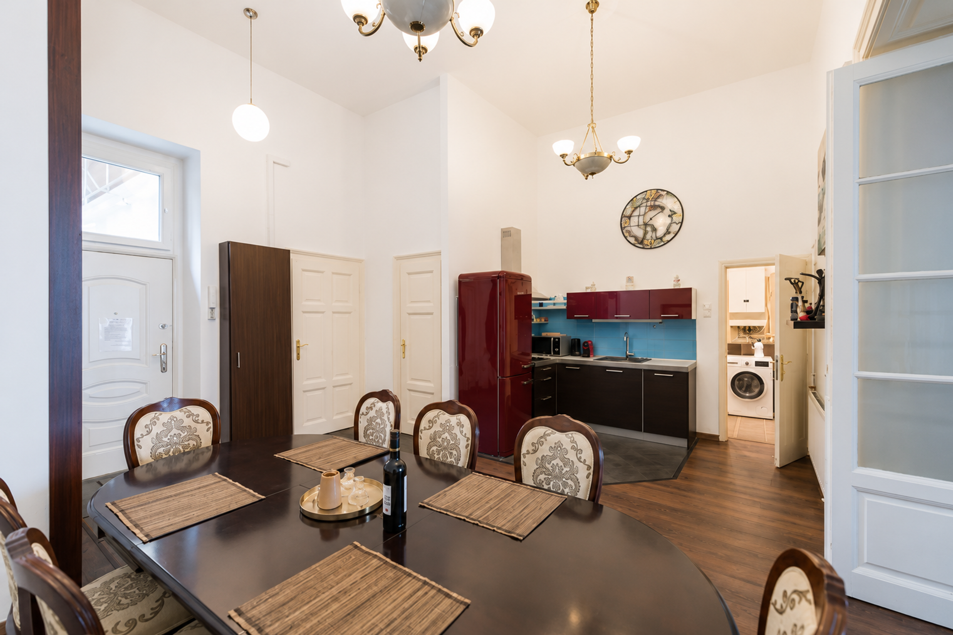 Dining area with kitchen behind
