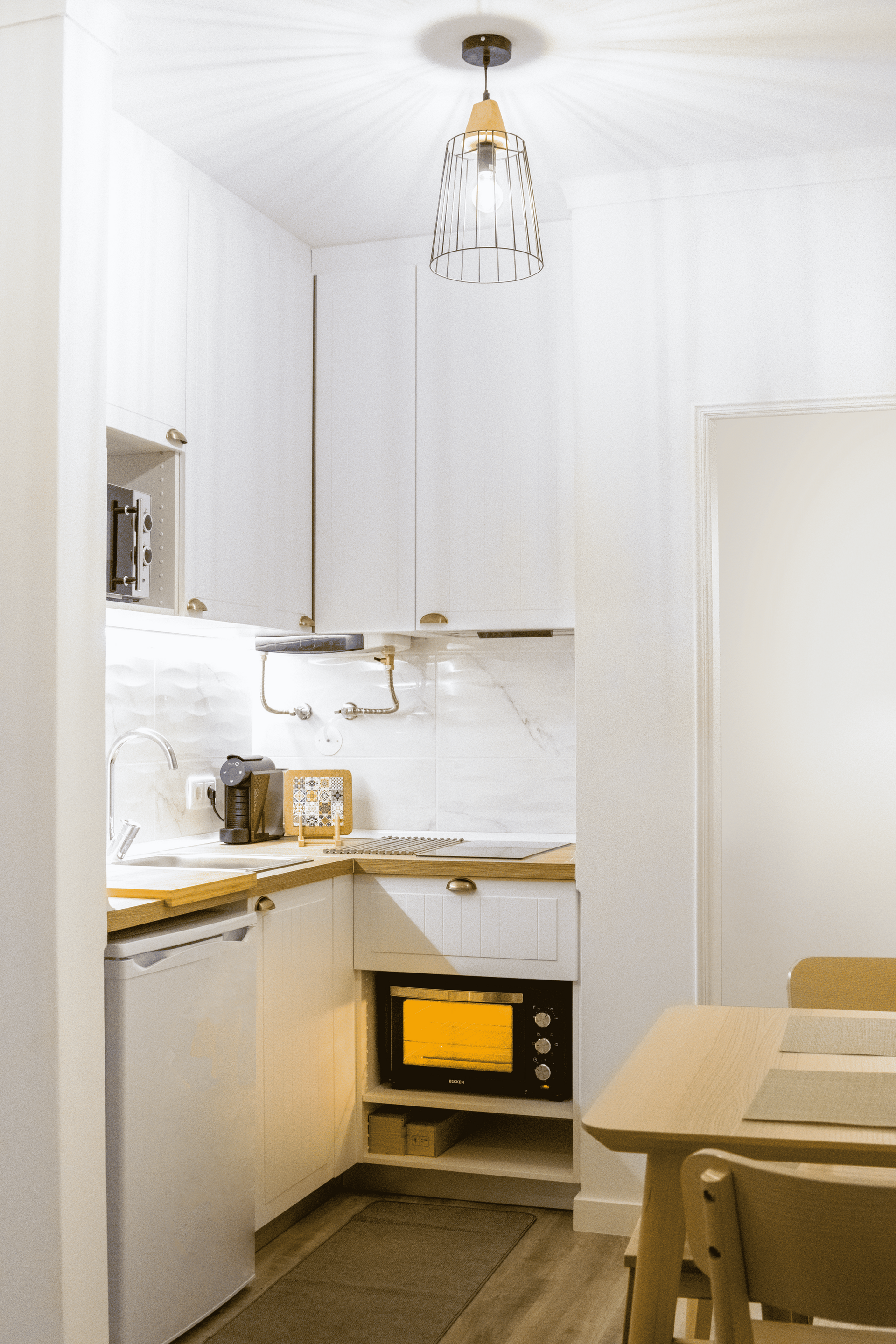 Compact kitchen with dining table