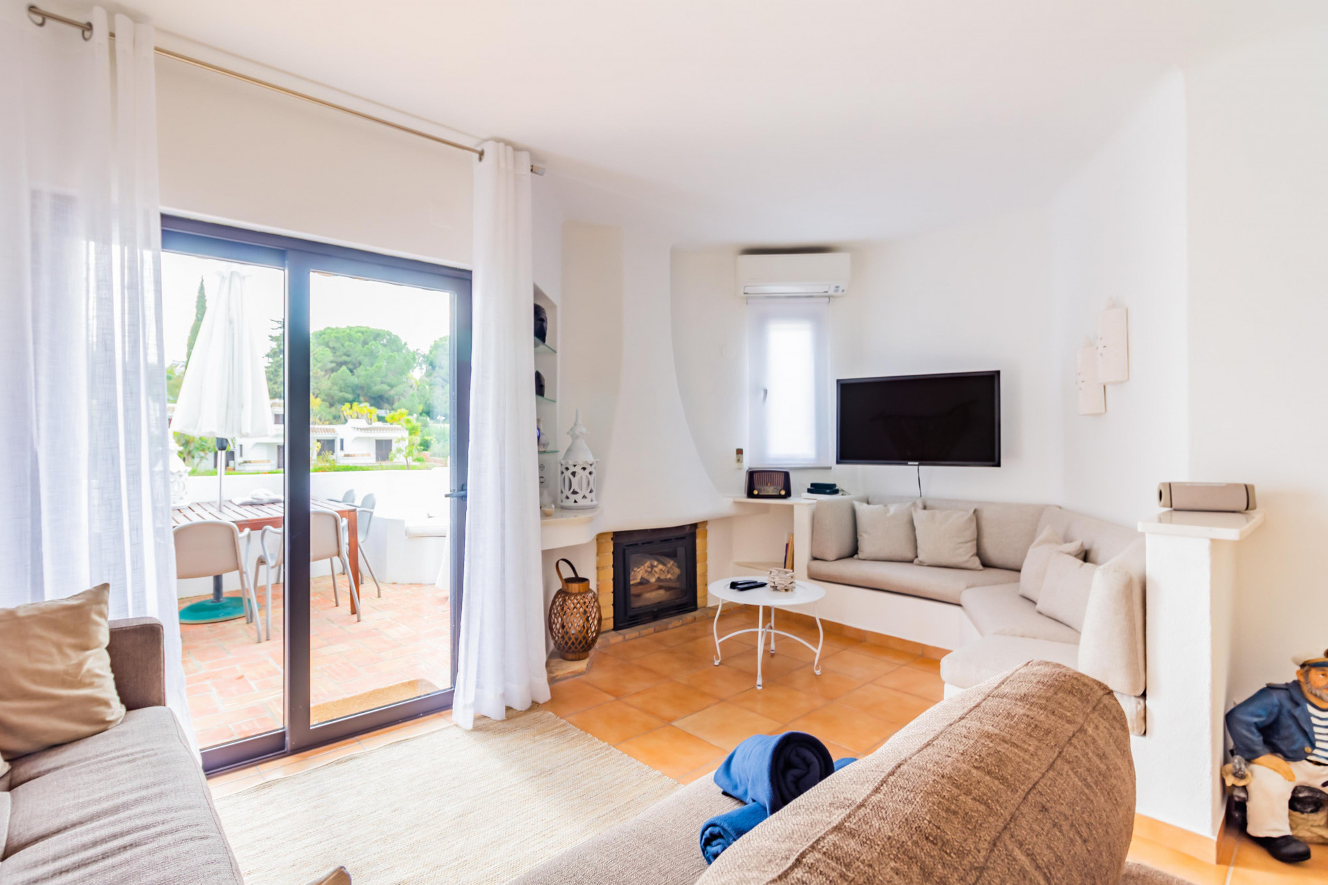Living Room with Flat-Screen TV, Sofa-Bed and Balcony