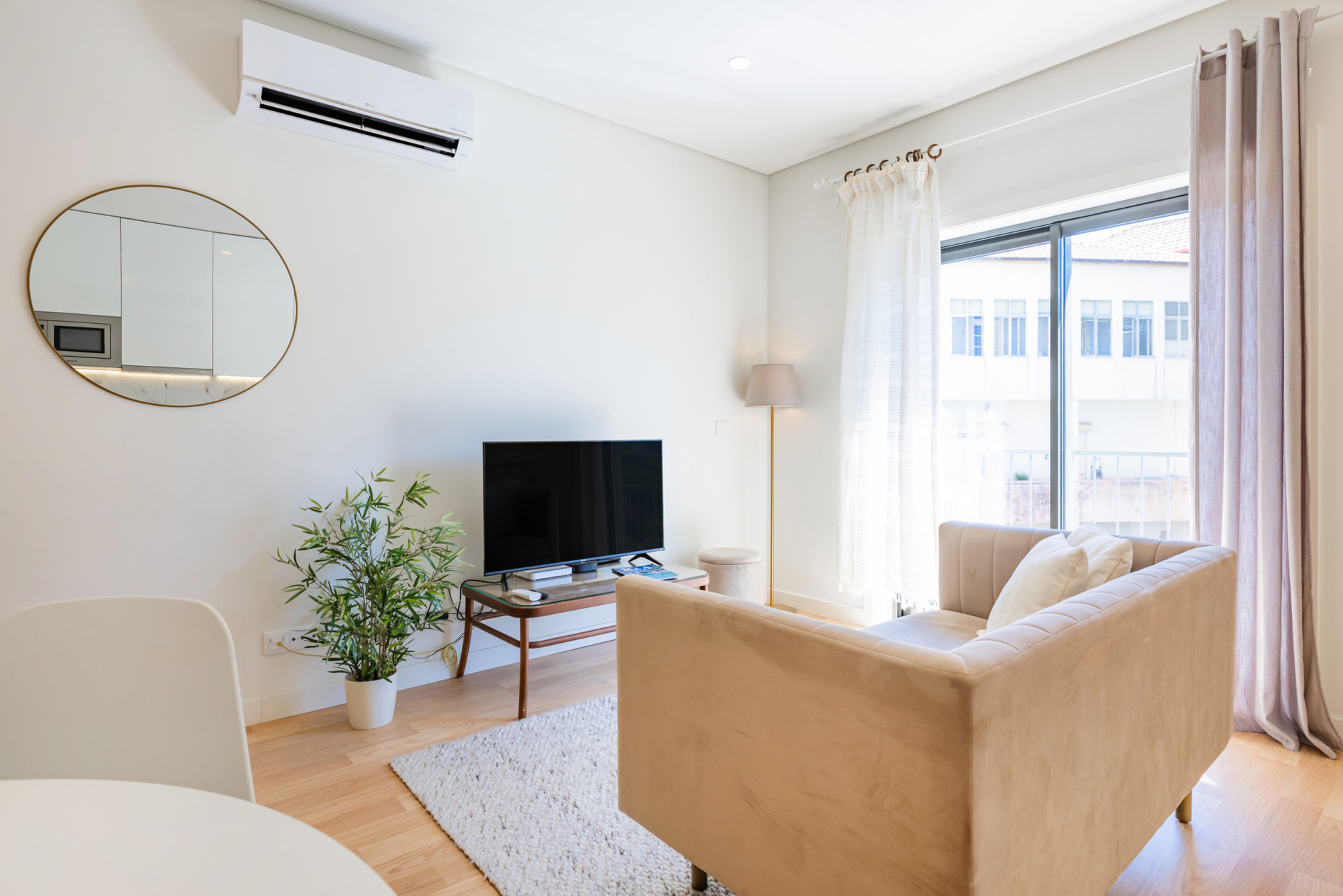 Living Room with AC and Fully Equipped kitchenette.