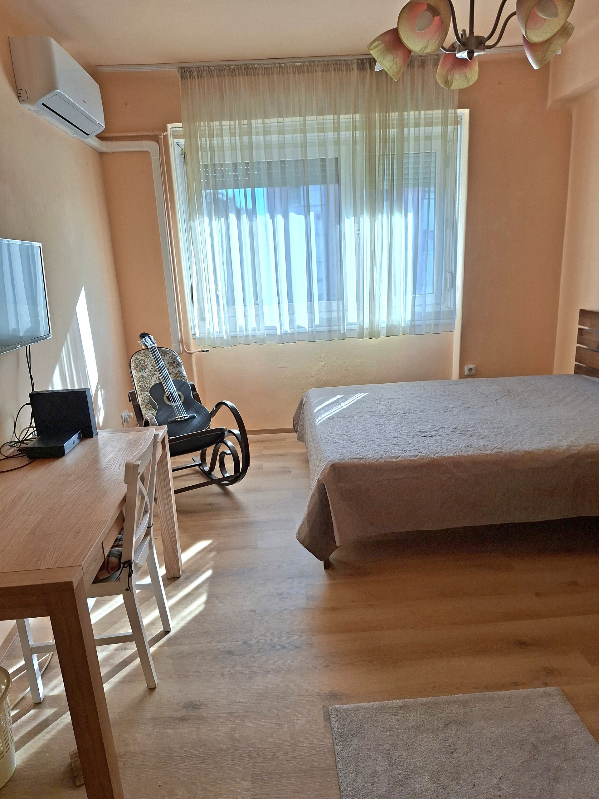 Bedroom with bed and desk