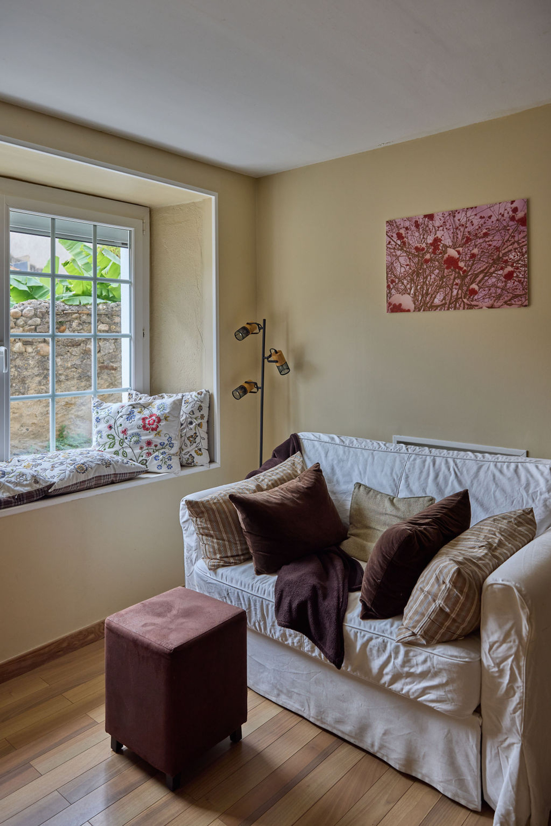 The living-room offers some cozy spaces to rest or work