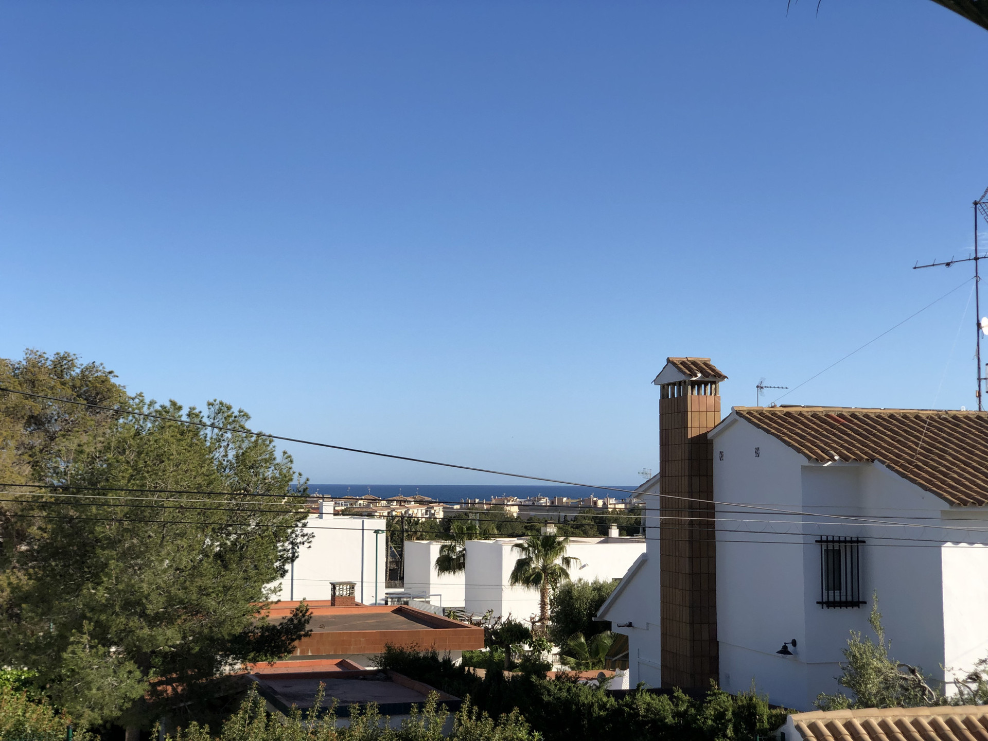 Terrace with distant sea views