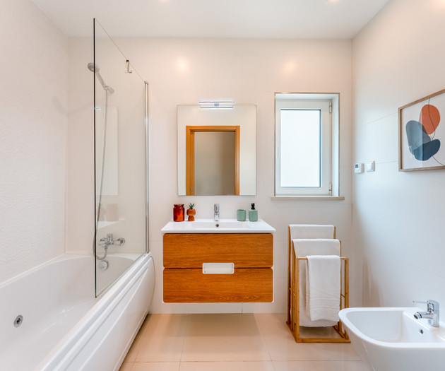 Bathroom with tub and vanity
