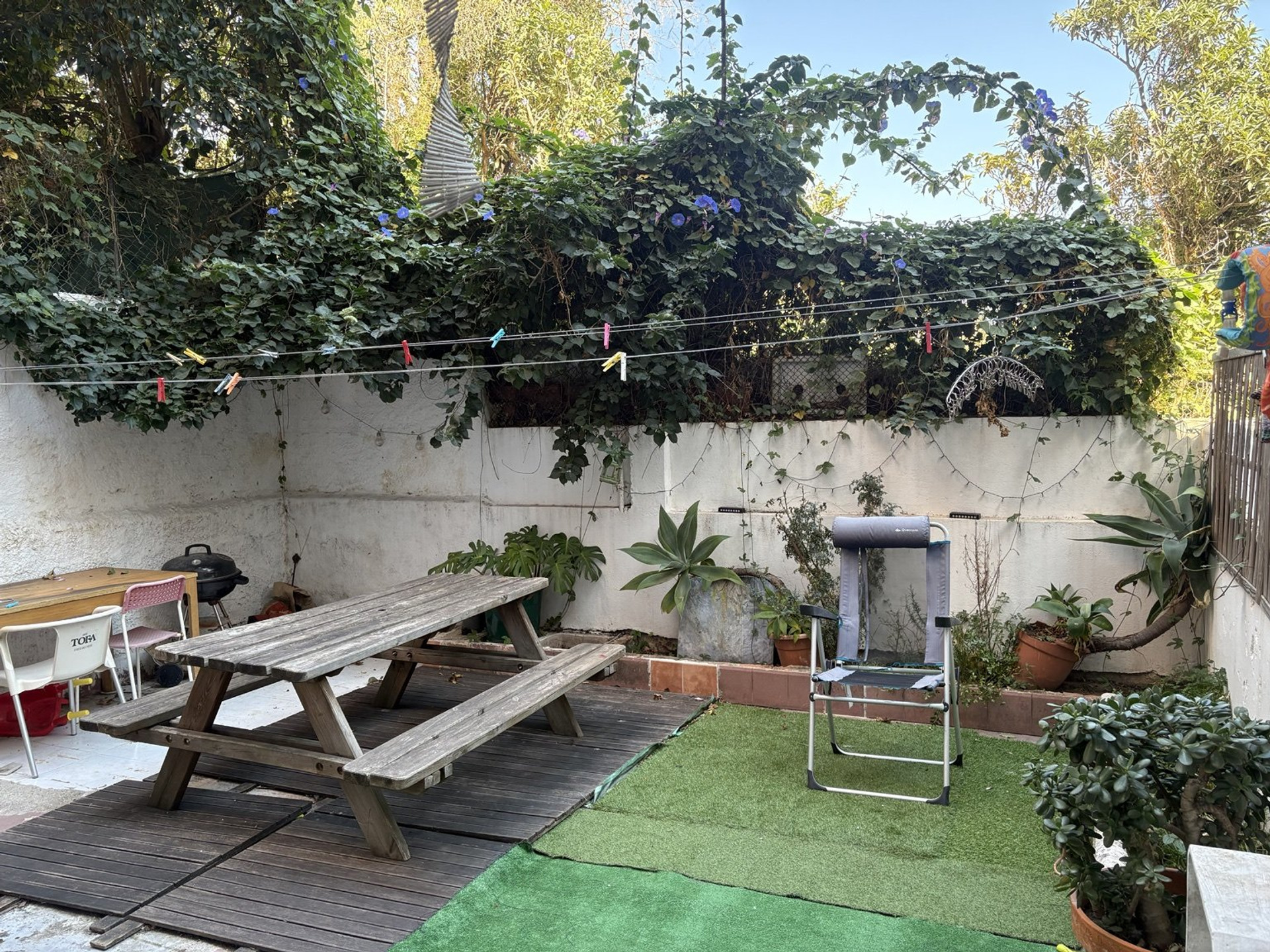 Backyard patio with picnic table