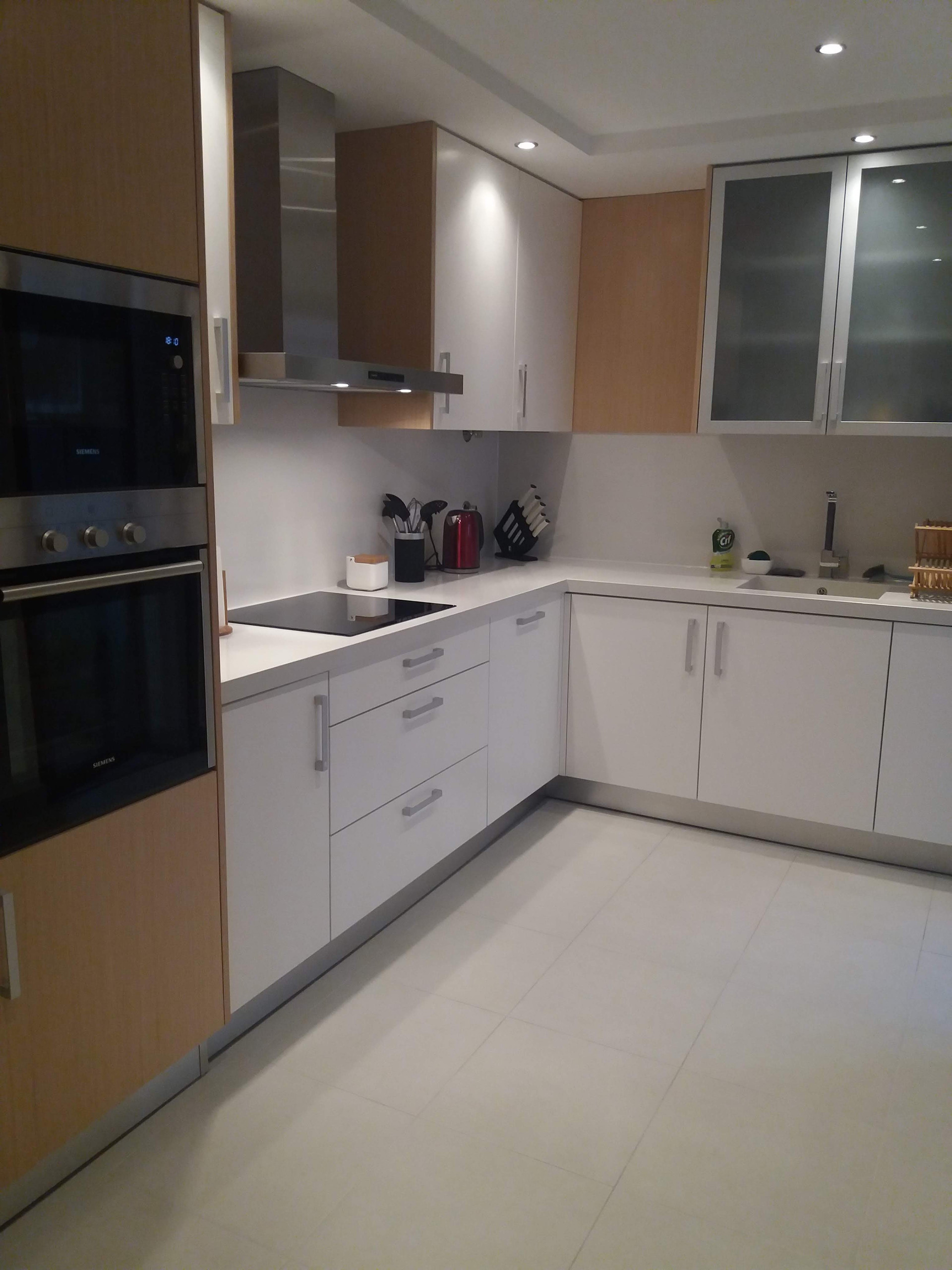 Modern white kitchen with appliances
