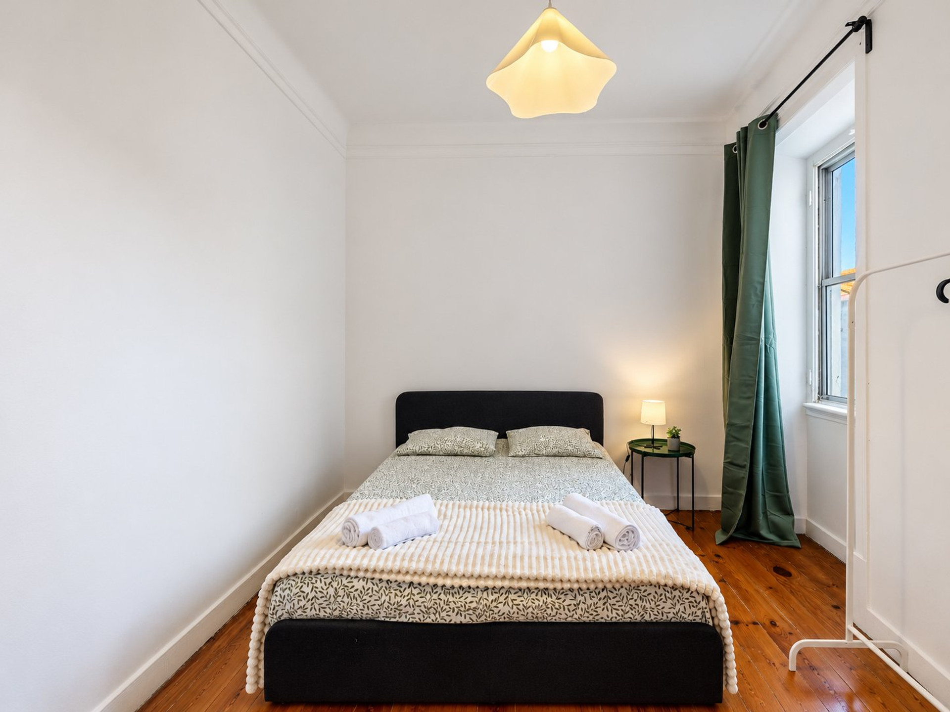Bright bedroom with double bed
