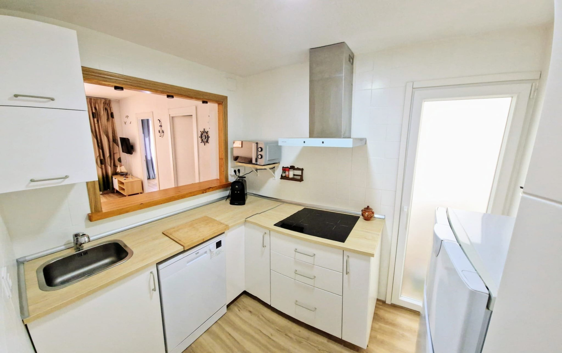 Kitchen with appliances and window