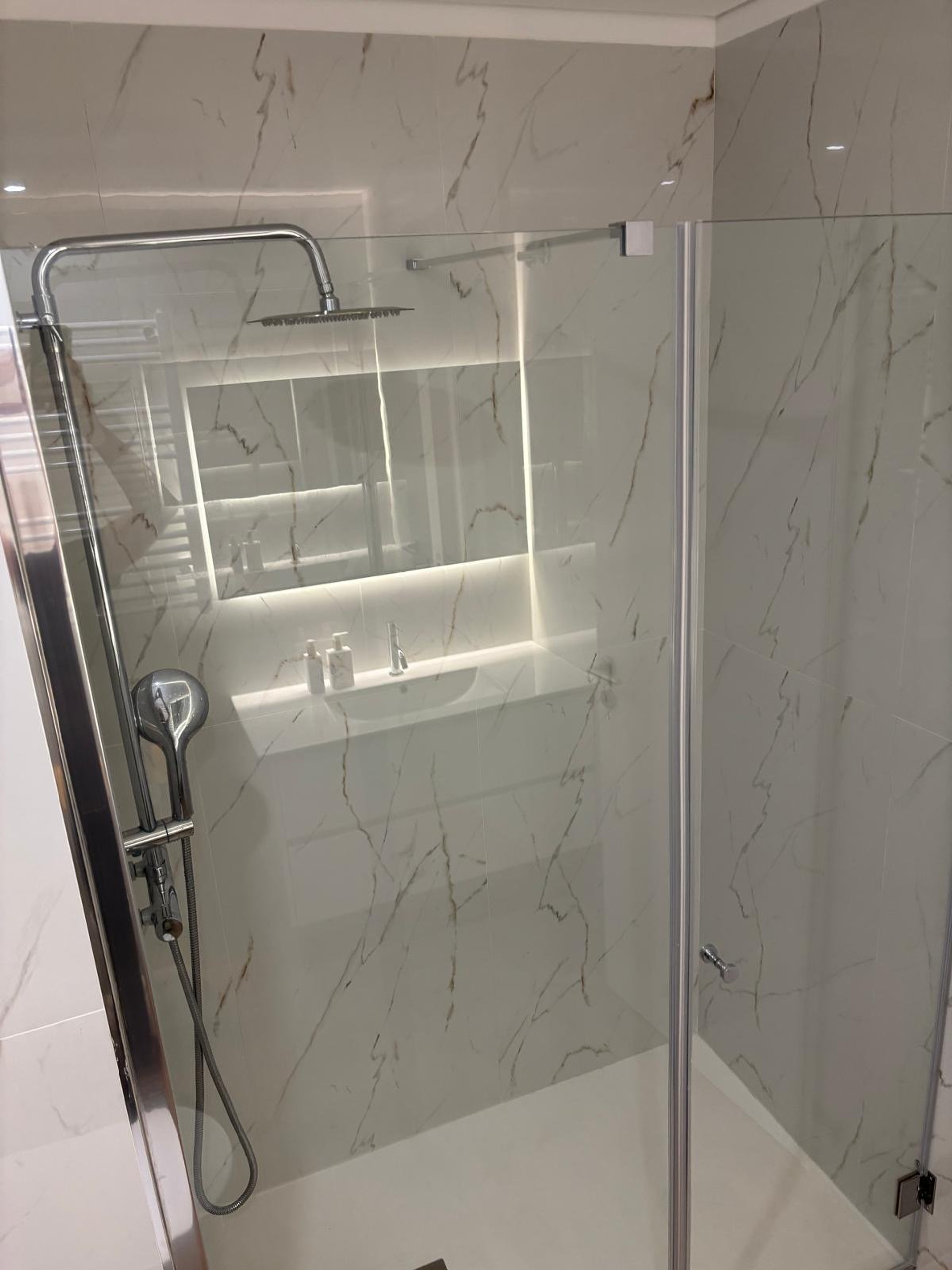 Marble shower with rain head