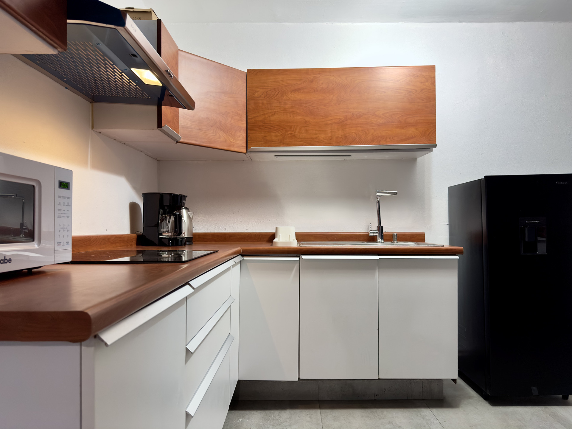 Kitchen with wood countertops appliances