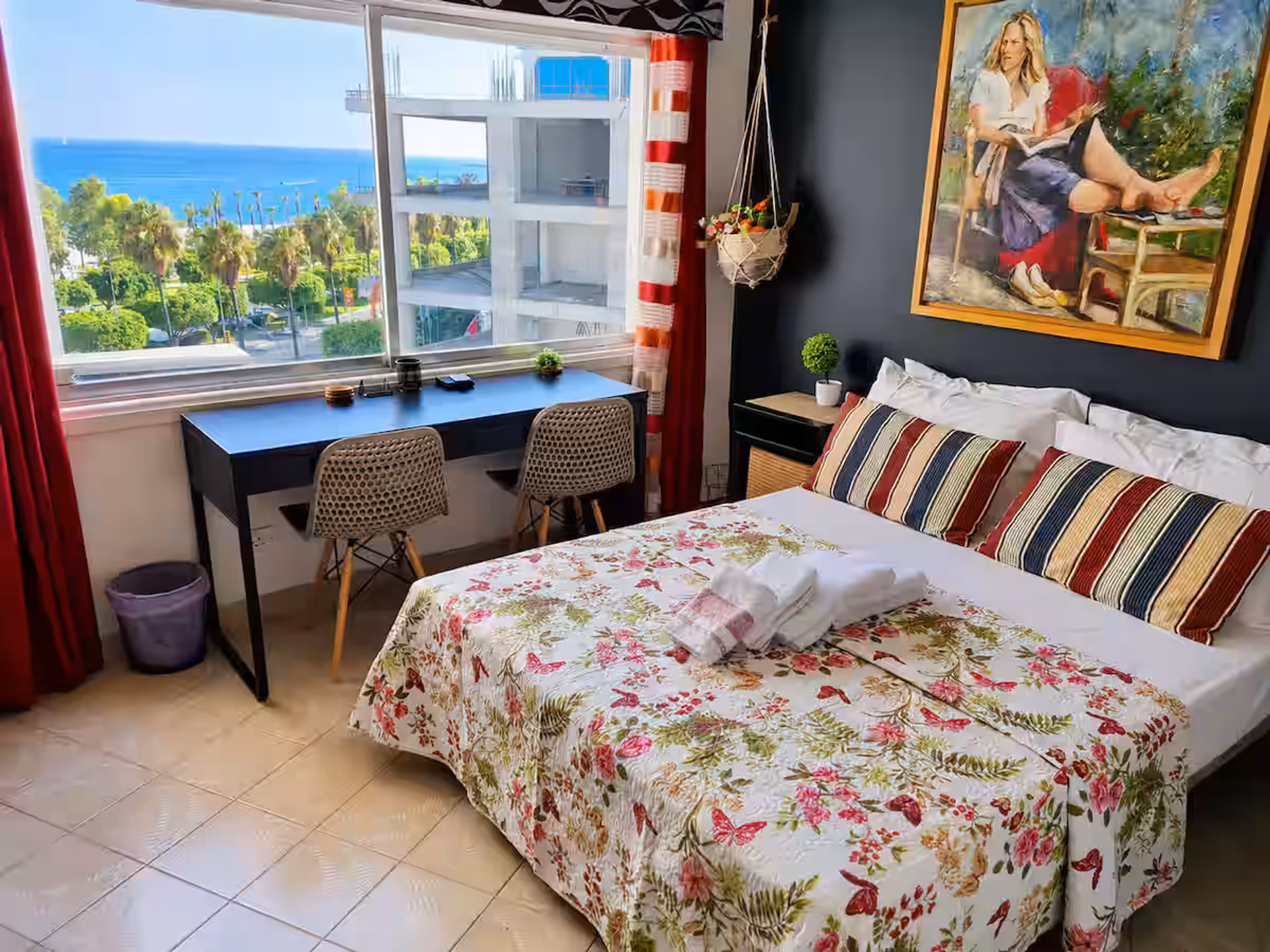 Bedroom with sea view and desk