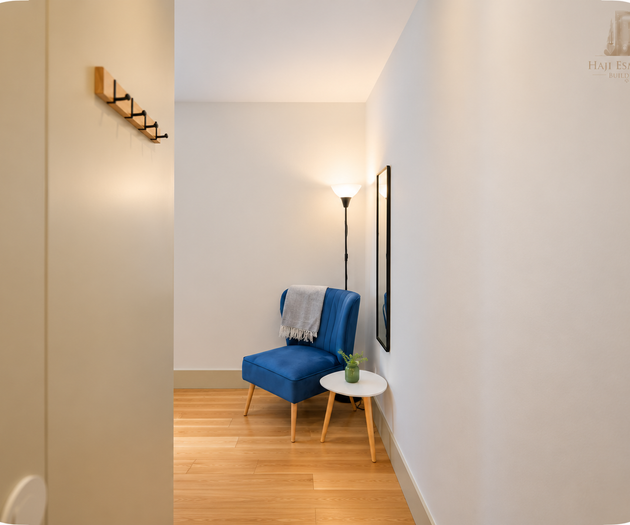 Hallway view to armchair corner