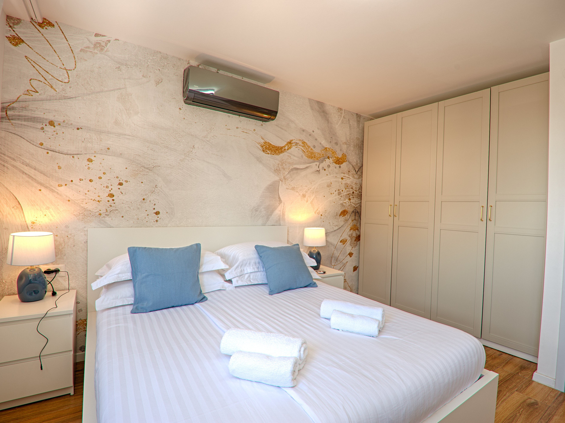 Bright bedroom with wardrobe