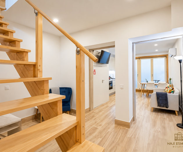 Staircase and hallway to living