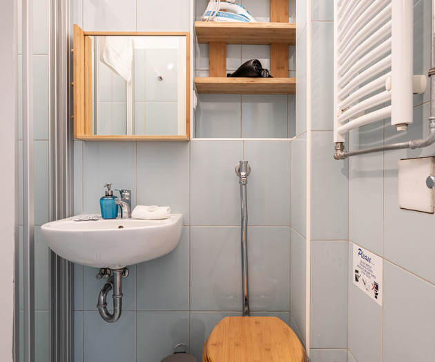 Small bathroom with toilet and sink