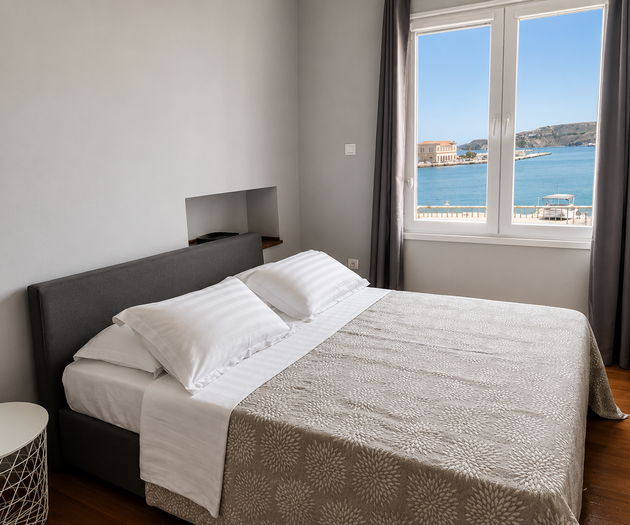 Bedroom with harbor view window