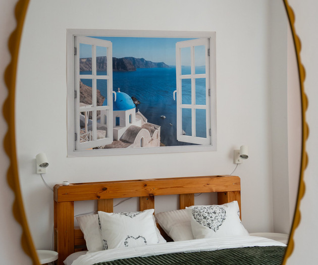 Bed reflected in mirror