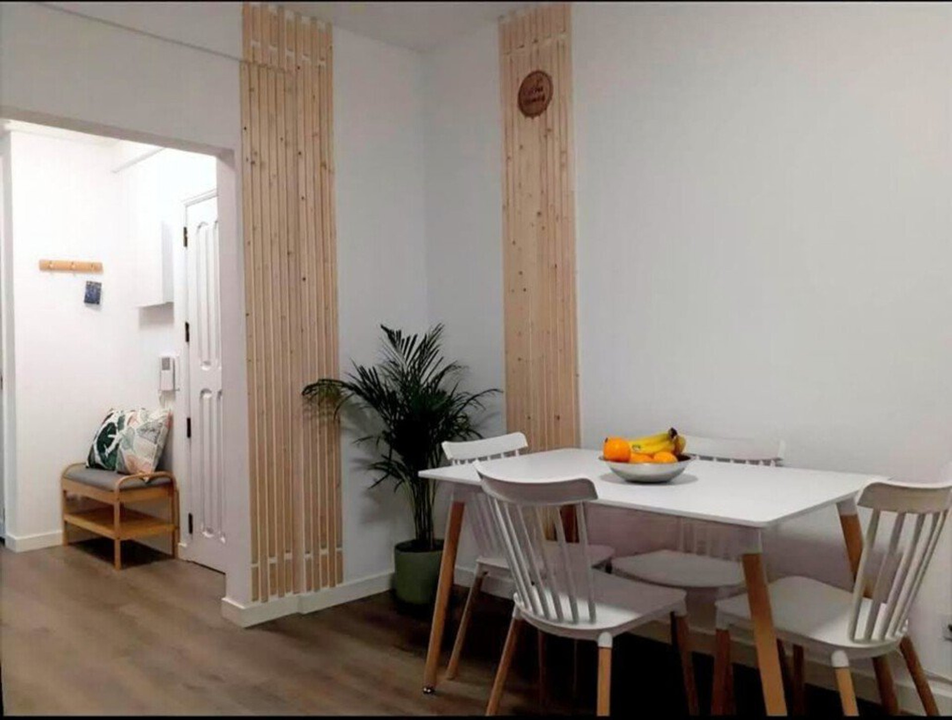 Dining table near entrance hallway