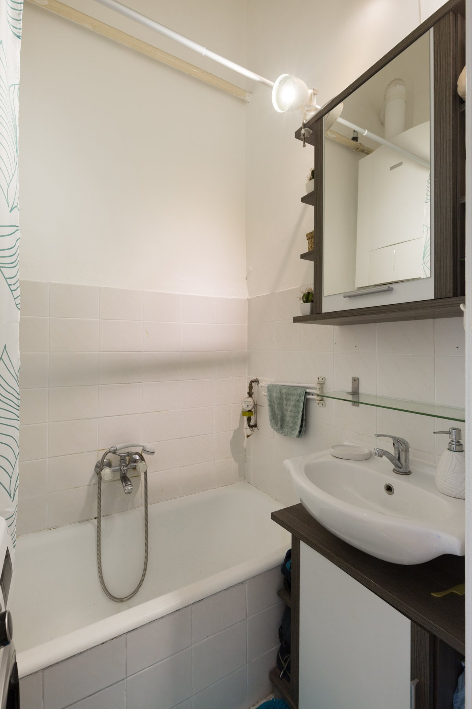 Bathroom with tub and sink